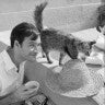 Black and white image of author Benjamin Breen with cat