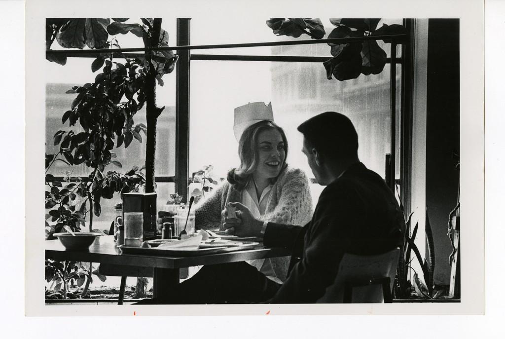 A nurse at lunch in the Food Services Building, 1970s