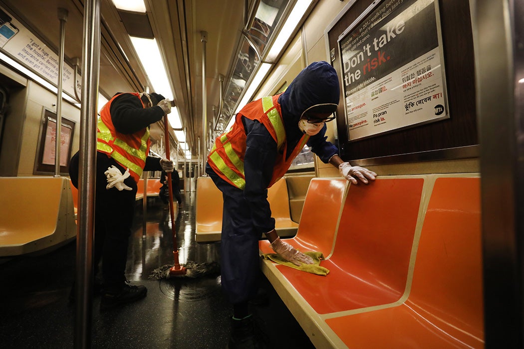 Workers clean a station as the New York City subway system is closed for nightly cleaning due to the continued spread of the coronavirus on May 07, 2020 in New York City.
