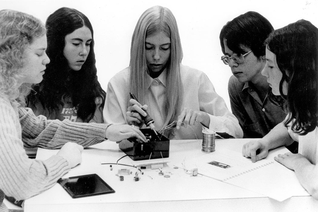 A group of high school students constructs basic measuring devices for testing air, water, noise, and radiation-pollution levels. c. 1972