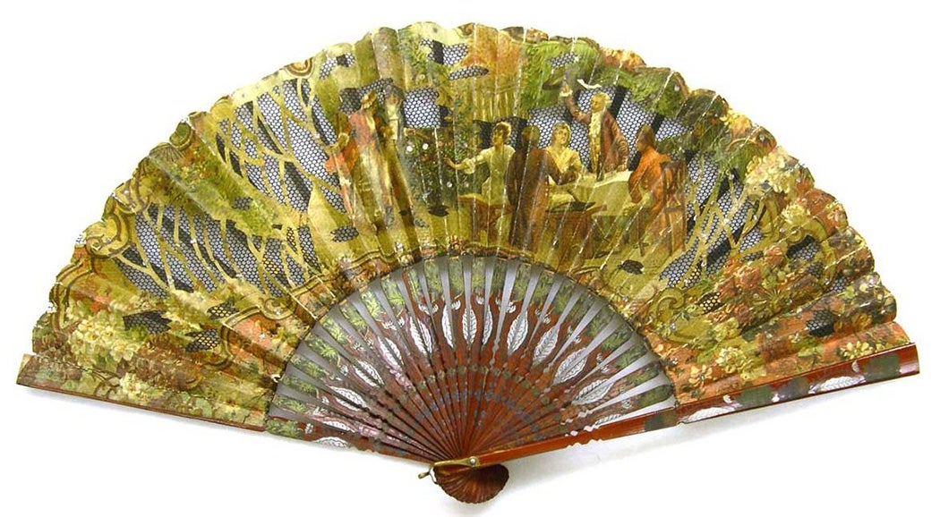Fan with sticks and guards painted brownish-red and accented with leaf and flower motifs painted in silver and gold.