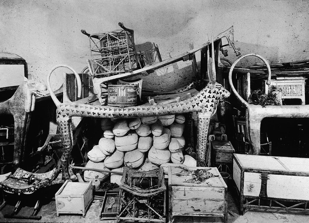 A group of objects found in the antechamber of King Tutankhamen's burial tomb, including a couch devoted to Hathor, goddess of the West, from the 18th Egyptian Dynasty.