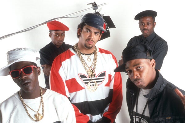 (Clockwise from bottom left) Flavor Flav, Professor Griff, Terminator X, S1W and Chuck D of the rap group Public Enemy pose for a portrait in a studio, 1988
