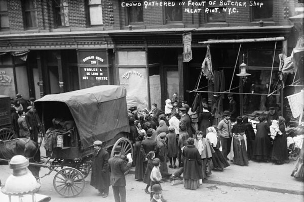Crowd gathered in front of butcher shop during meat riot, New York