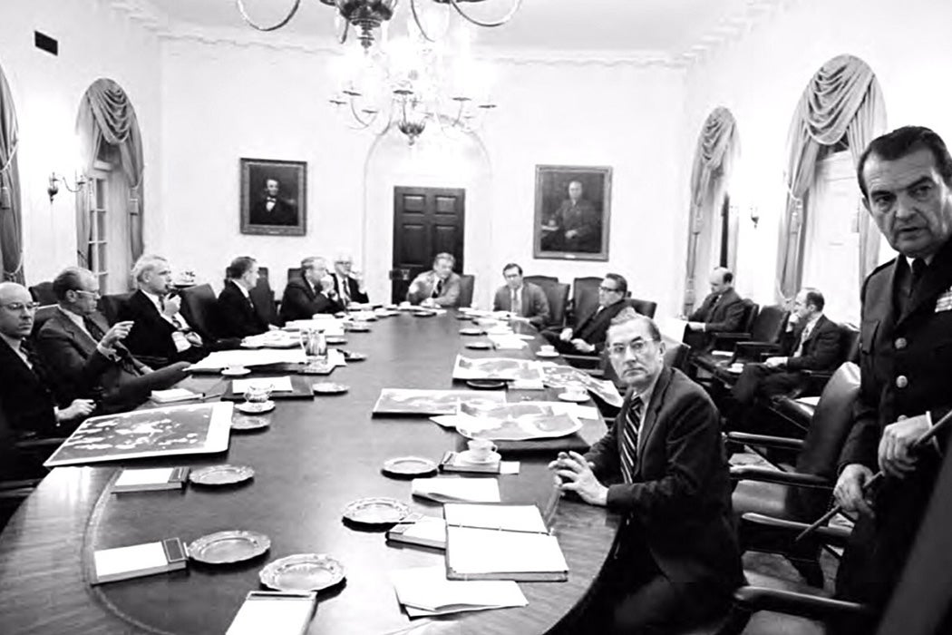 Air Force Chief of Staff General David C. Jones briefs the National Security Council on possible military options during the second meeting on the Mayaguez crisis, 1975