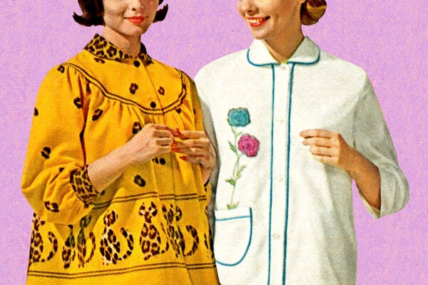 Woman in Leopard Outfit With Woman in Blue Outfit