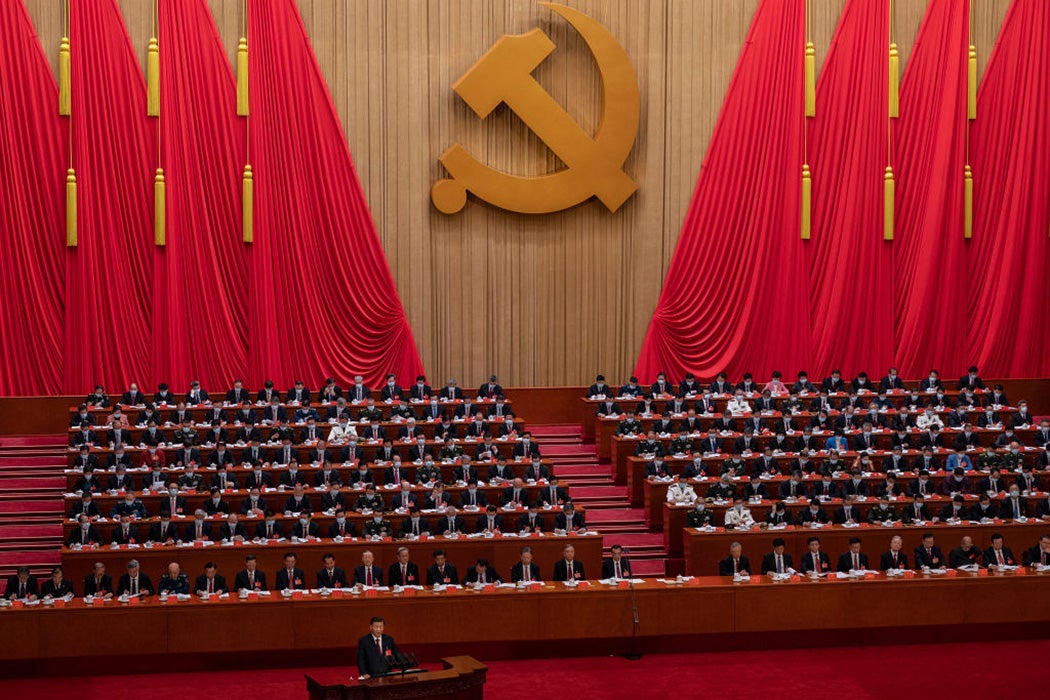 Chinese President Xi Jinping, bottom left, speaks during the Opening Ceremony of the 20th National Congress of the Communist Party of China at The Great Hall of People on October 16, 2022 in Beijing, China.