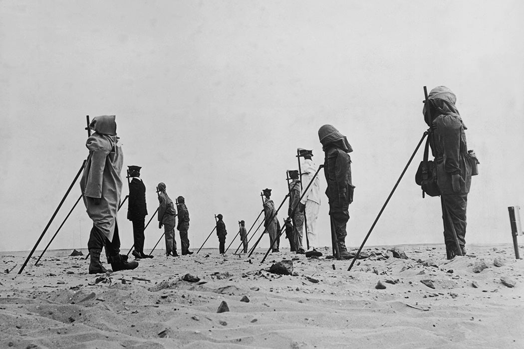 A set of dummies propped up in the Sahara Desert awaiting a third atomic bomb explosion during the French nuclear testing.