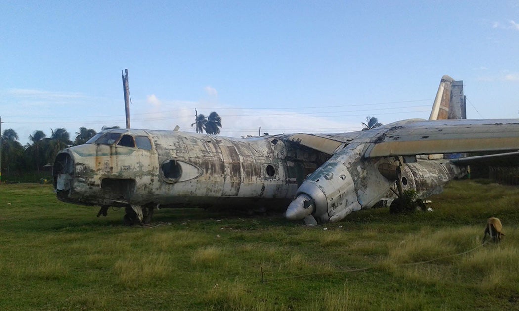 A dilapidated Cuban-Soviet airplane on Pearls airfield