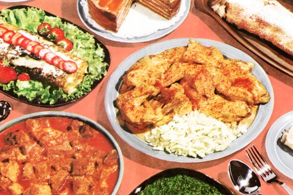 A table with many dishes of food